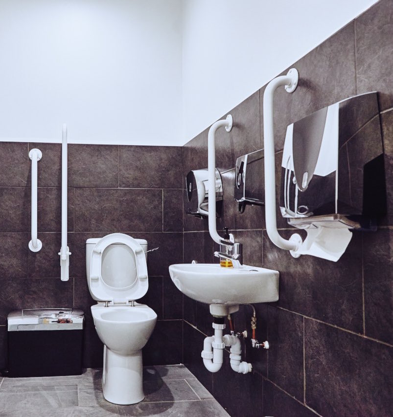 dda compliment office toilet branding theme